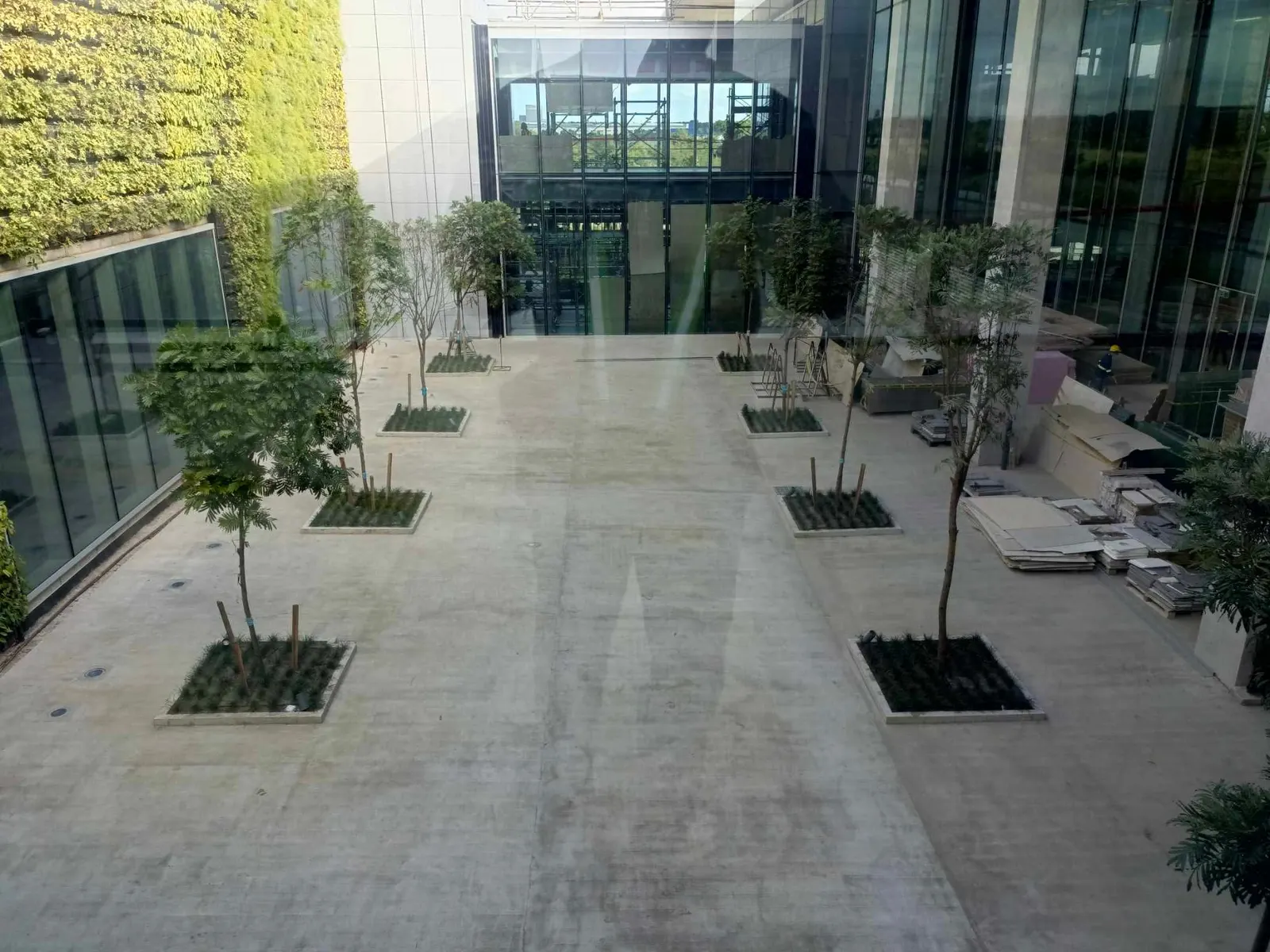 Courtyard planters and greenwall planting at the manufacturing campus