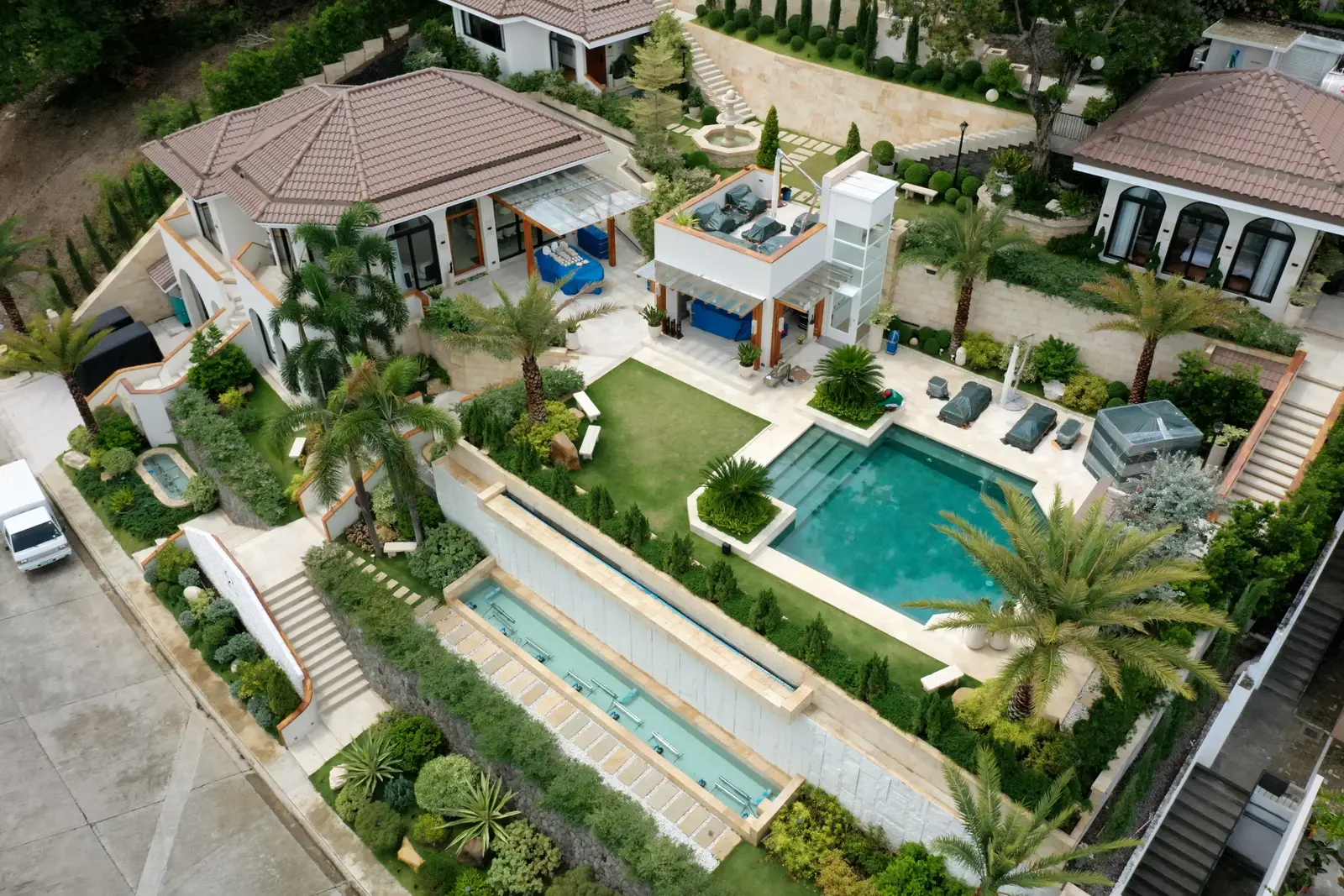 Aerial view of the full landscaped grounds of a Punta Fuego private estate