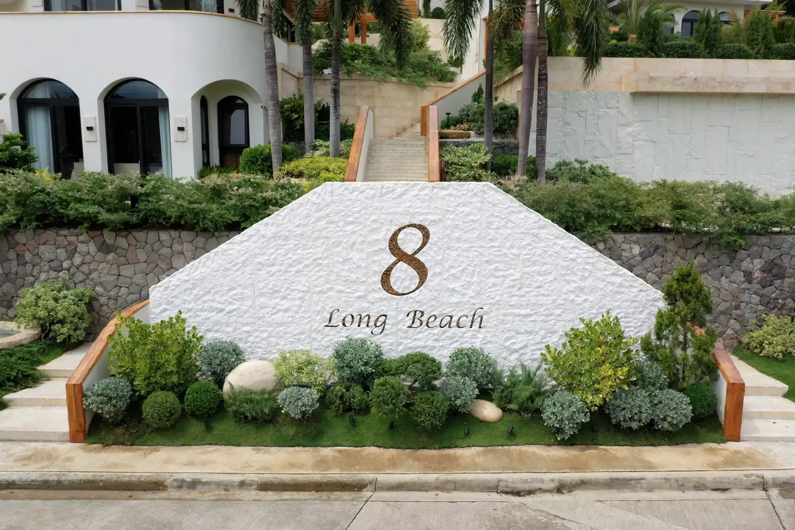 Grand entrance monument and planting at a Punta Fuego private estate