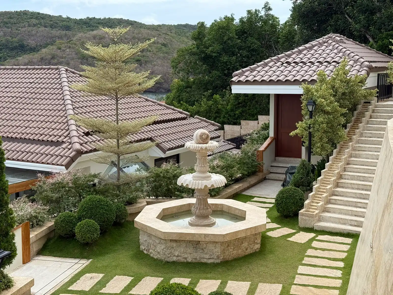 Formal fountain courtyard garden at a Punta Fuego private estate