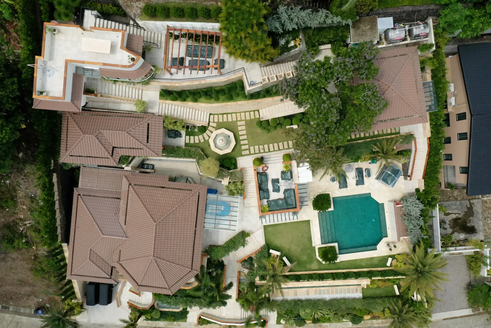 Aerial view of a finished resort estate landscape design with pool and hardscape, Peninsula de Punta Fuego
